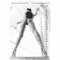 Calendar page with a black and white image of a woman in lingerie and high heels, holding a glass.