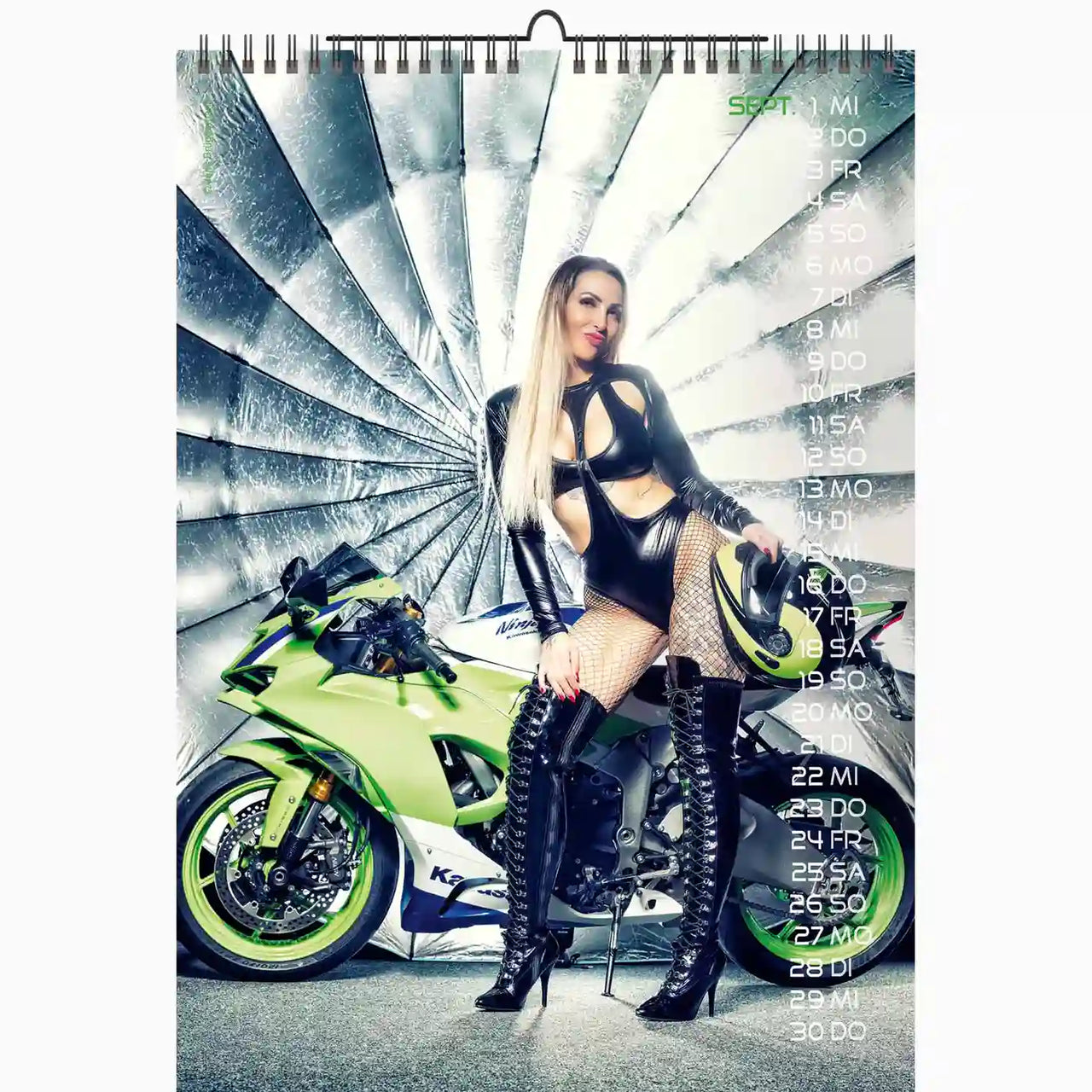 Calendar with a woman in a black outfit sitting on a green motorcycle.