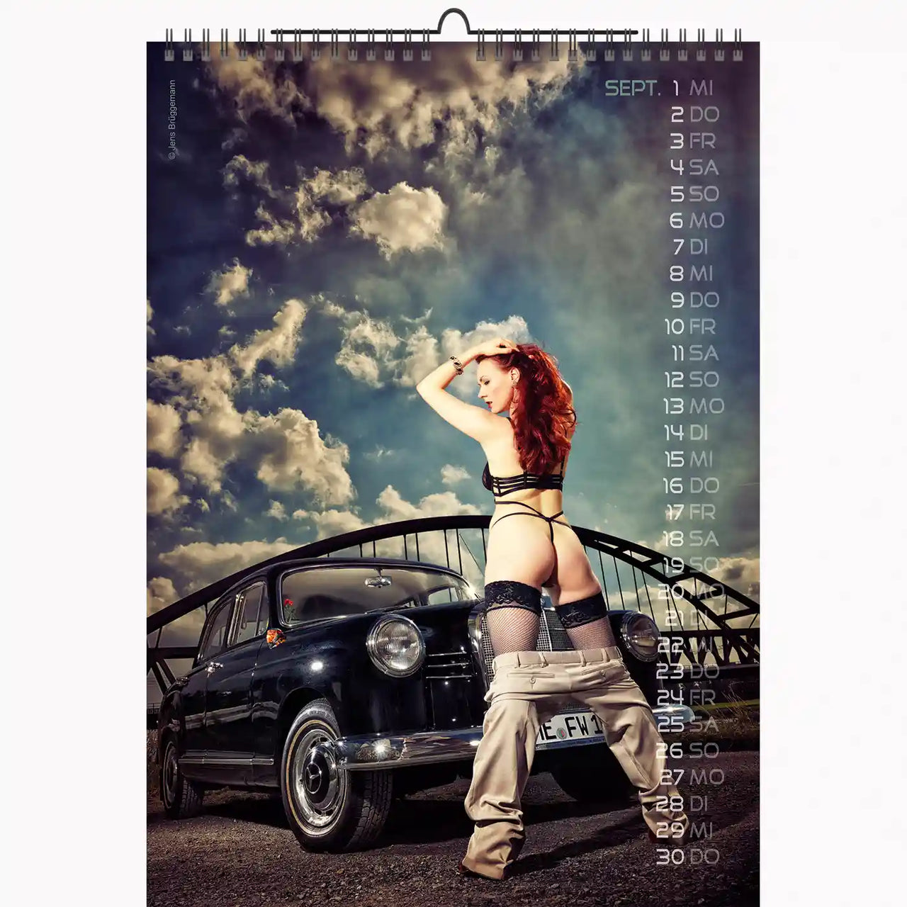 Calendar with a scenic background and a car, featuring a person in a bikini.