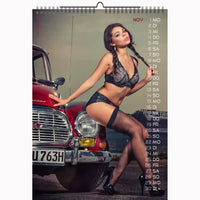Calendar with a model posing next to a red car, featuring a scenic background.