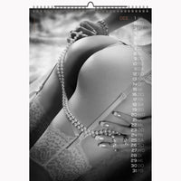 Calendar with a black and white image of a woman's body, featuring a pearl necklace and lace detail.
