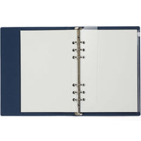 Blue ring binder with white pages on a white background