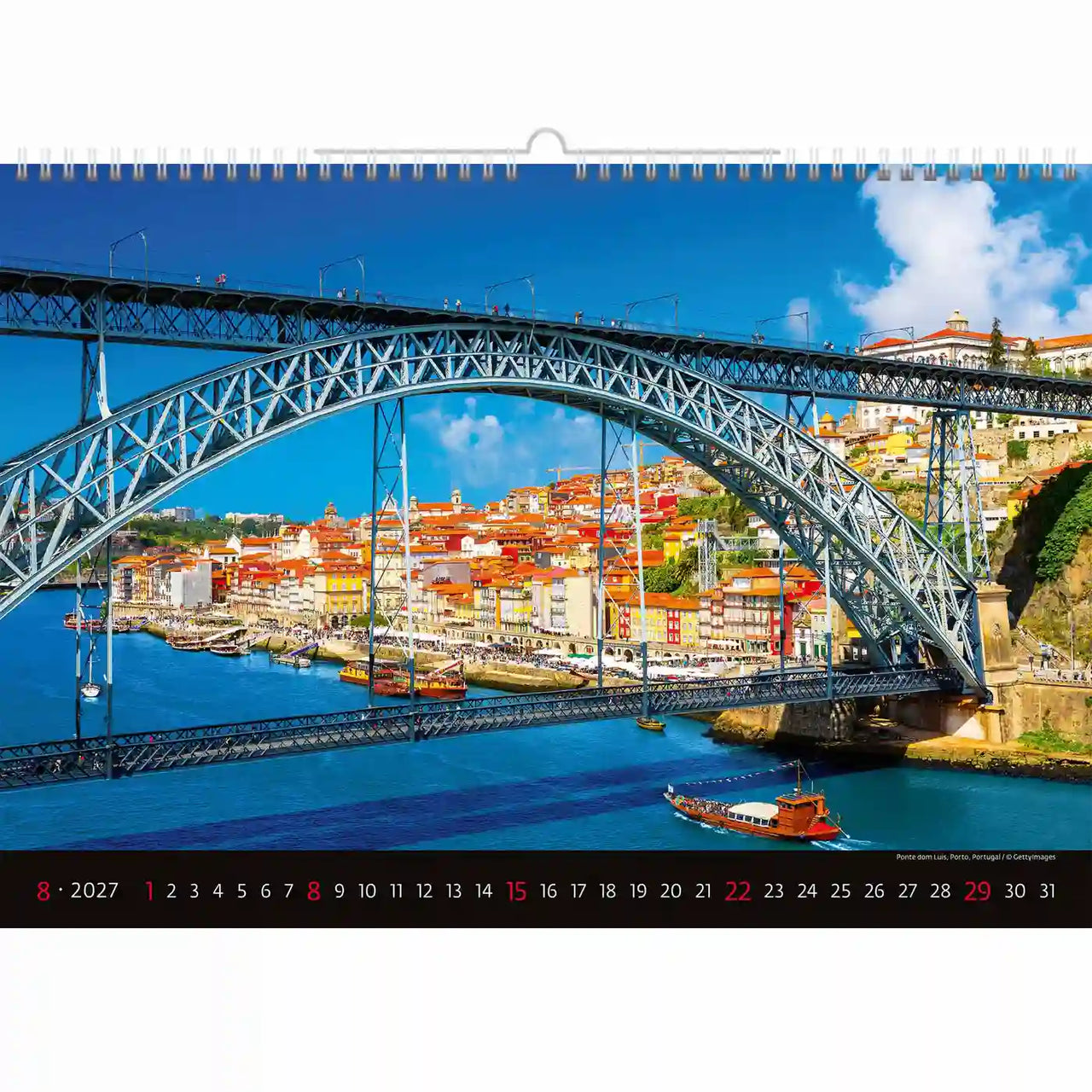 Kalender met een schilderachtig uitzicht op een brug over een rivier en kleurrijke gebouwen.
