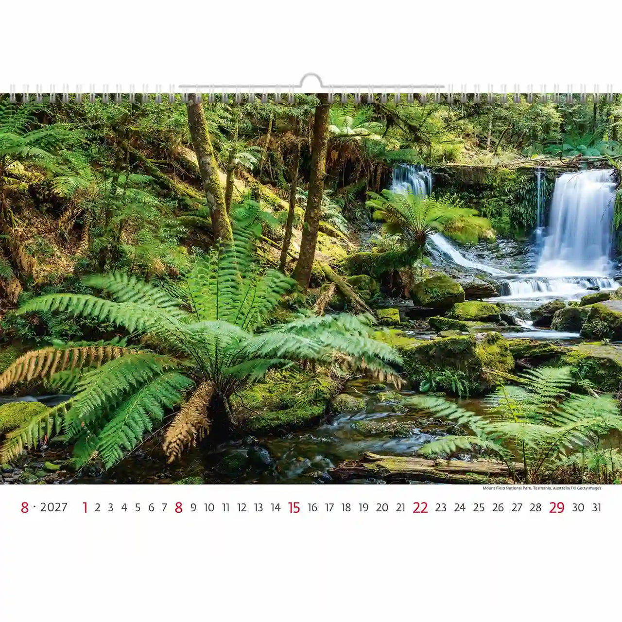 Kalender met een schilderachtig uitzicht op een waterval en weelderig groen