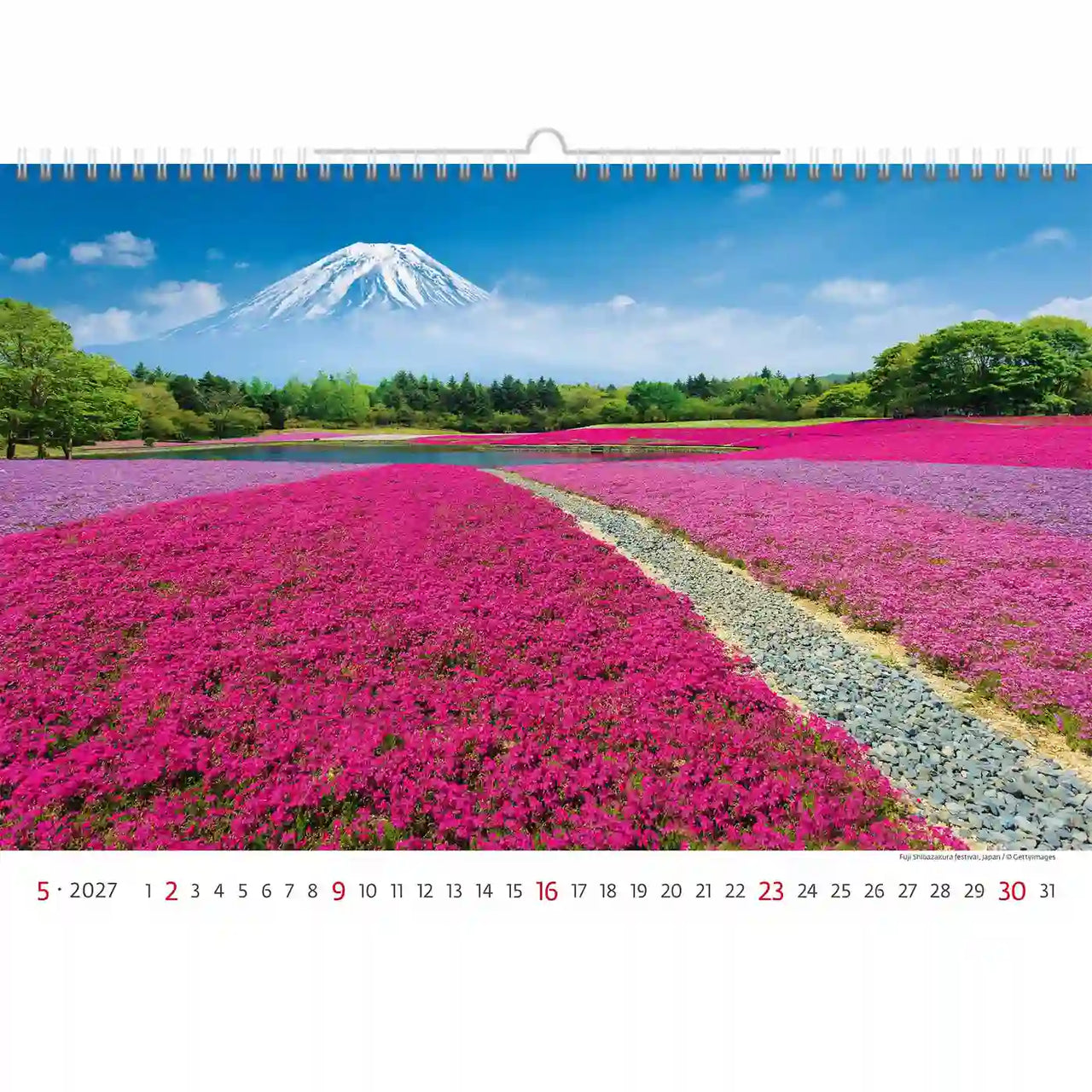 Kalender met een schilderachtig uitzicht op de berg Fuji en roze bloemen op de voorgrond