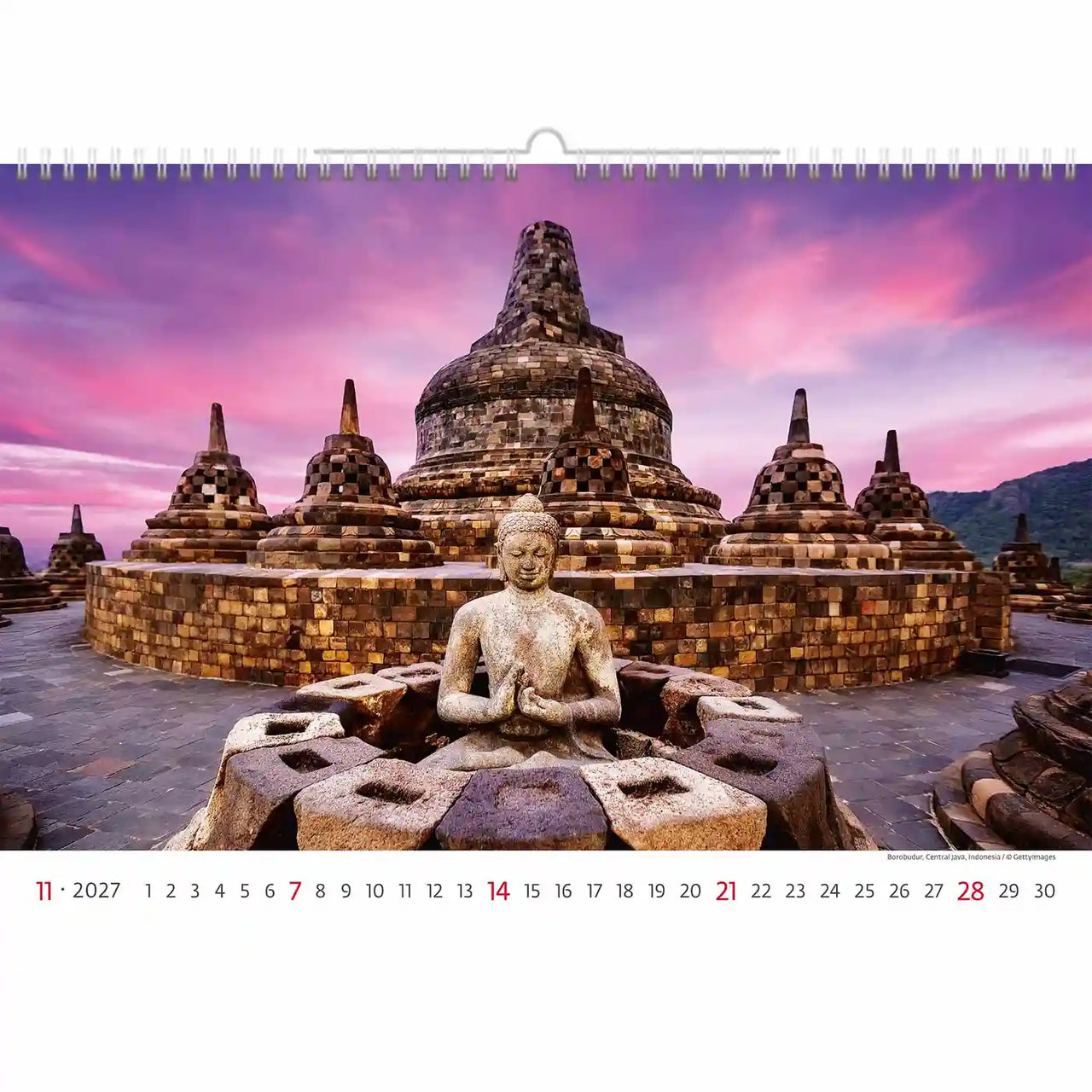 Kalender met een Boeddhabeeld en tempel bij zonsondergang
