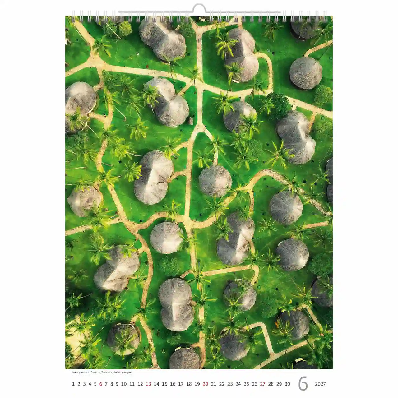 Kalenderpagina met een patroon van grijze vormen op groene achtergrond