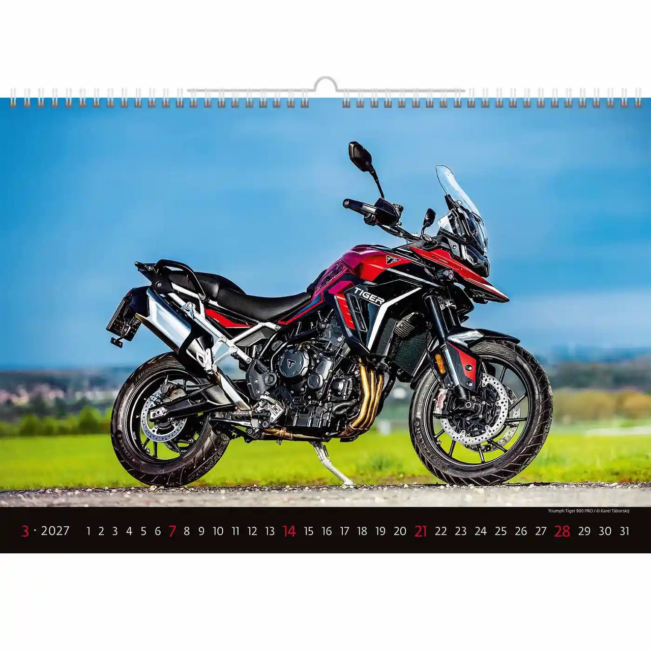 Motorkalender met een schilderachtige achtergrond