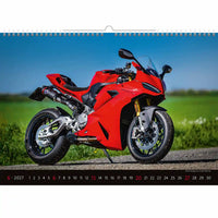 Rode motorfiets op een kalender met een schilderachtige achtergrond