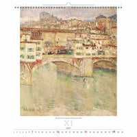 Wandkalender met een schilderij van een brug en een stad op een witte achtergrond