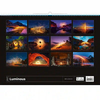 Kalender met 12 afbeeldingen van verlichte landschappen en bouwwerken, gemerkt 'Luminous'.