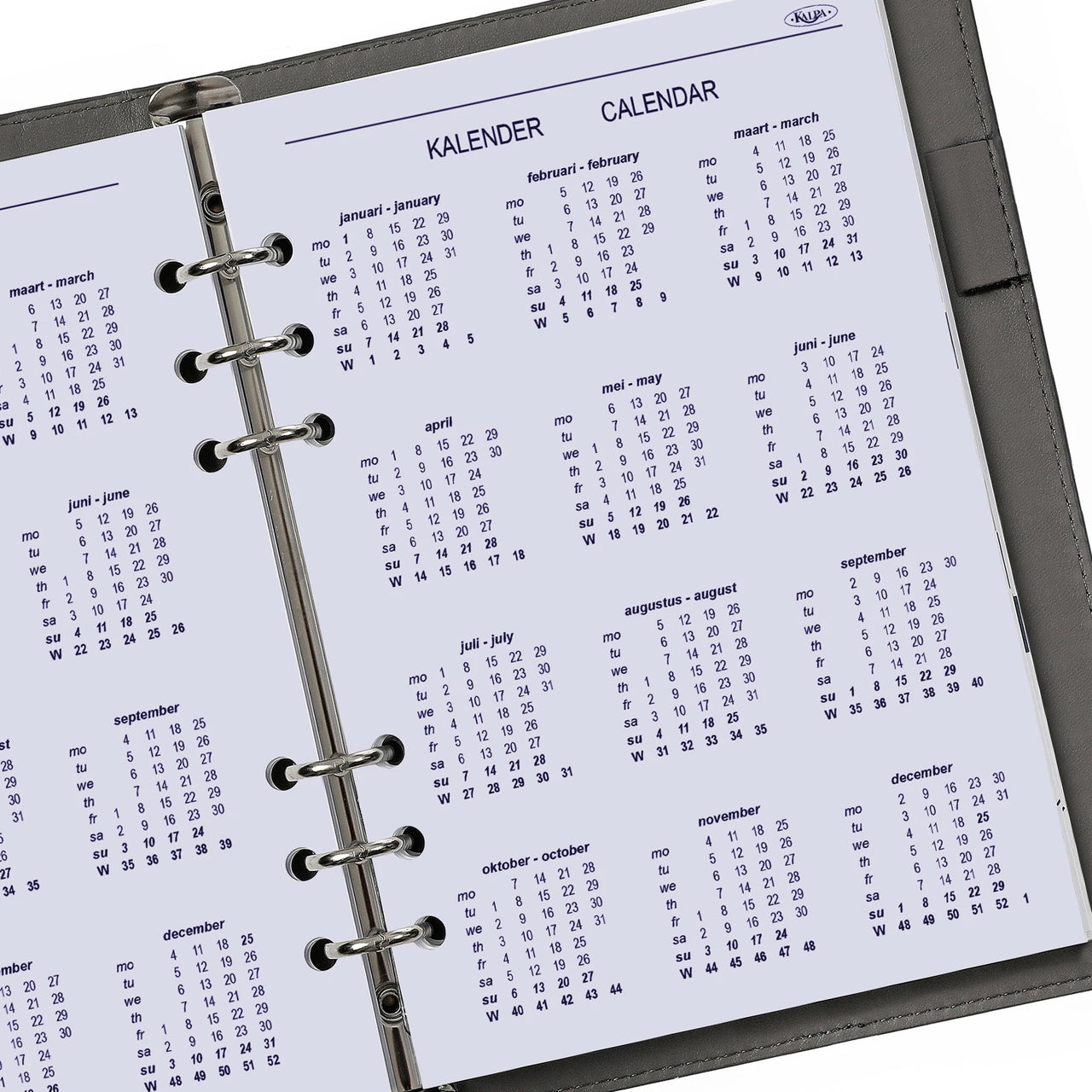 Calendar page in a planner with a metallic ring binding.