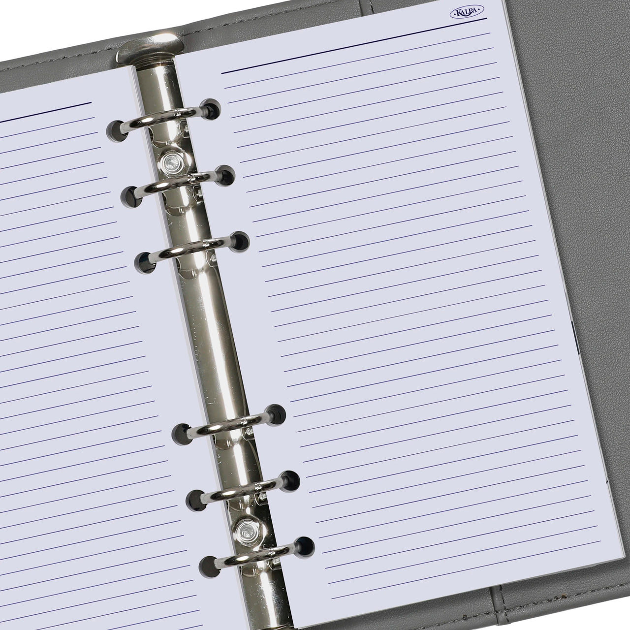 Close-up of a planner with a silver ring binder on a gray background