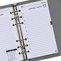 Close-up van een ringgebonden planner met een geopende kalenderpagina waarop de data en dagen van de agenda staan week.