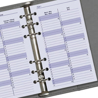 Close-up van een planner met een maandkalender indeling.
