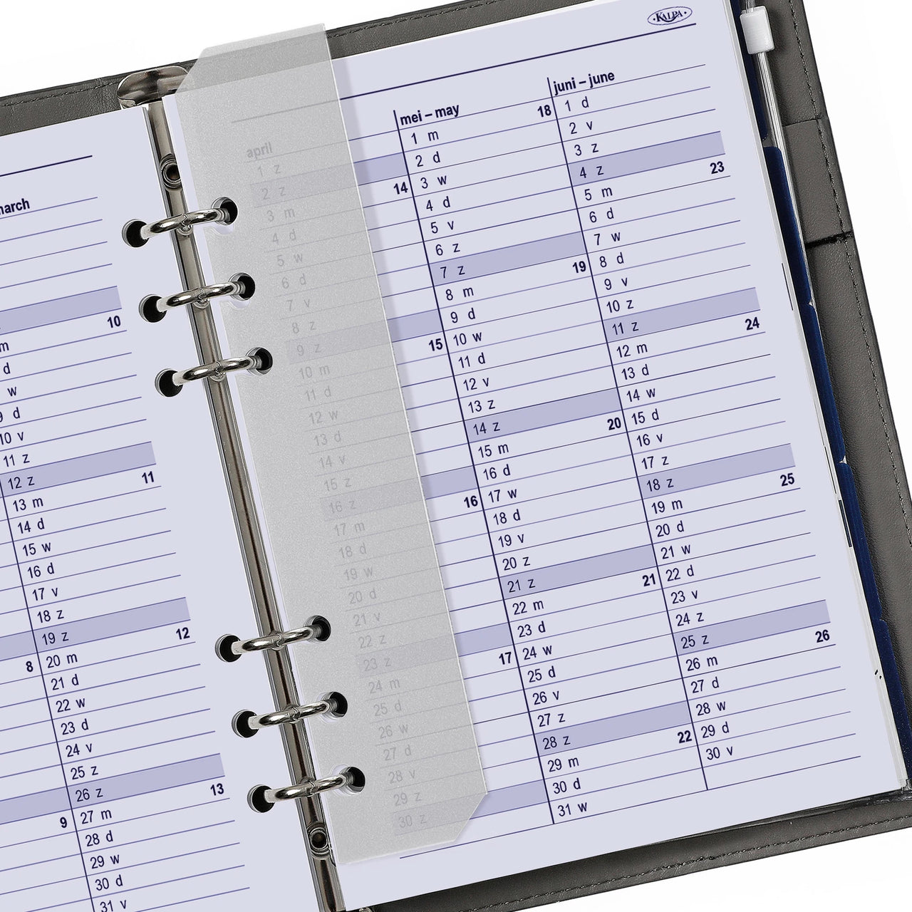 Close-up of a planner with a monthly calendar layout on a white background