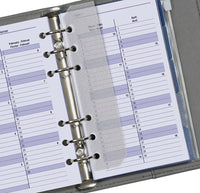 Open planner met maandkalender pagina's op een Ringband
