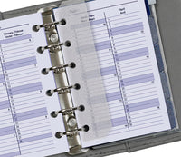 Close-up of a planner with a monthly layout, showing days of the week and dates.