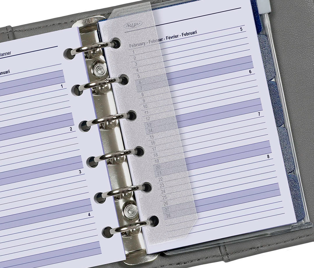 Close-up of a planner with a ring binding system