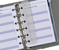 Close-up of a planner with a ring binding system