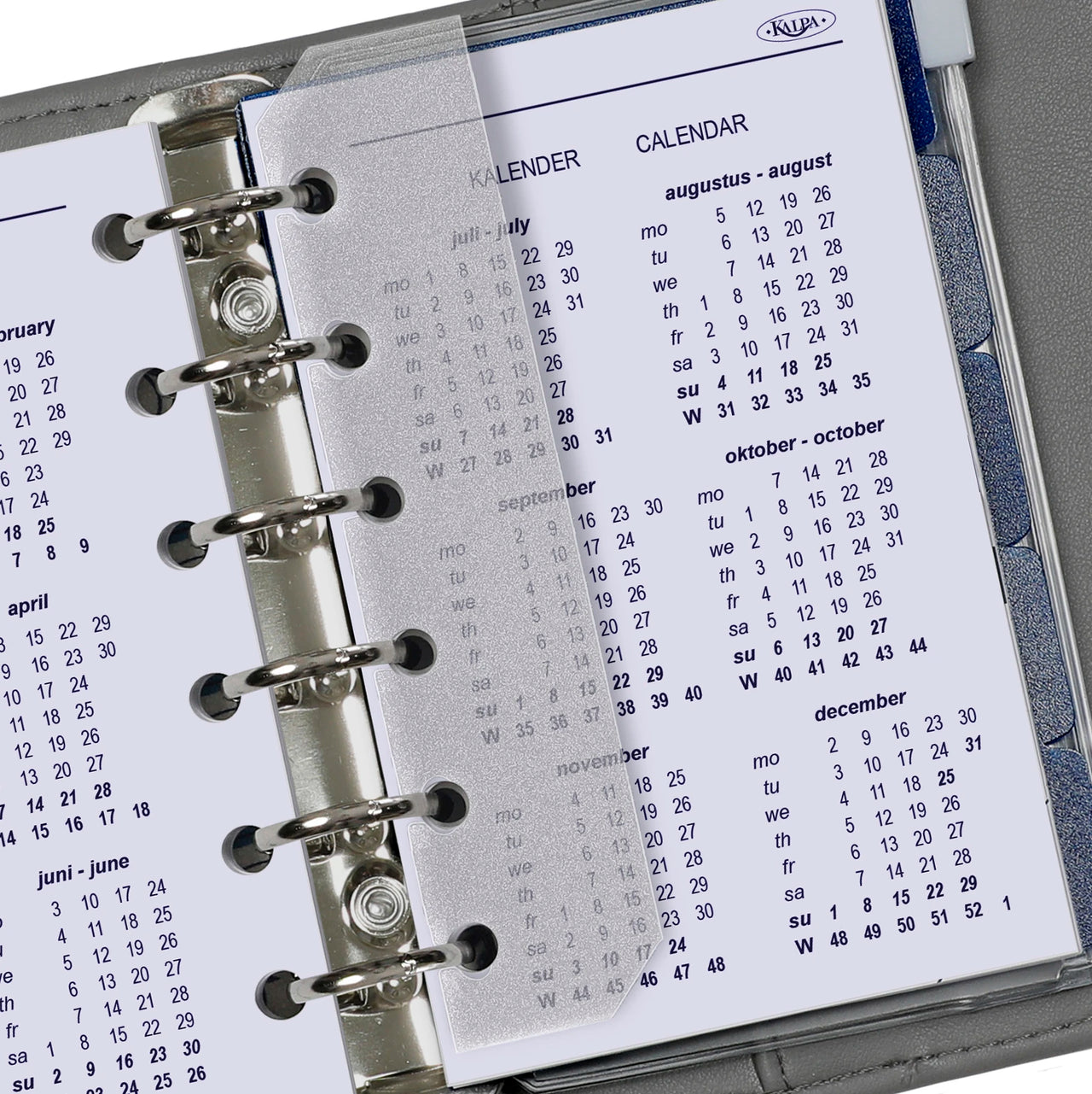 Close-up of a calendar page in a planner with visible brand name.